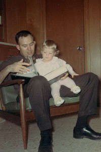 My dad and me looking through family photos.
